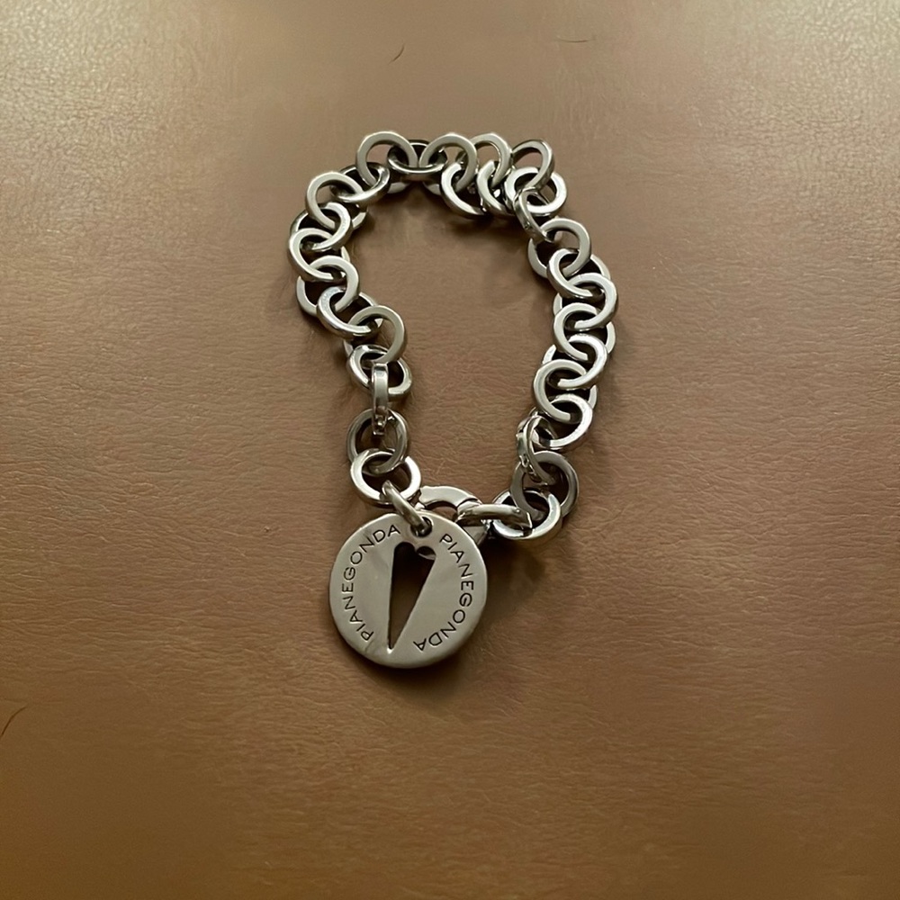 Sterling silver Pianegonda link bracelet with heart charm.